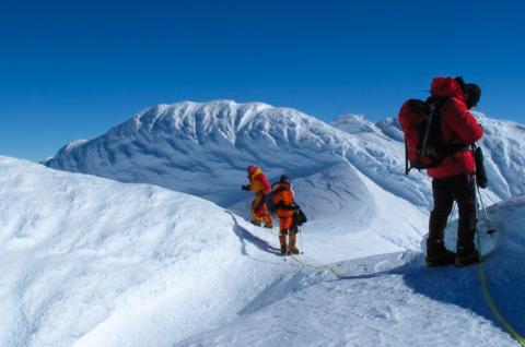 Route finding through snow rime 'mushrooms' on Mount Sidley's summit ridge.