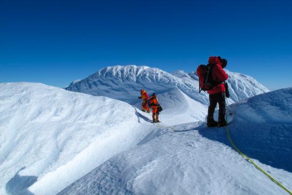 Route finding through snow rime 'mushrooms' on Mount Sidley's summit ridge.