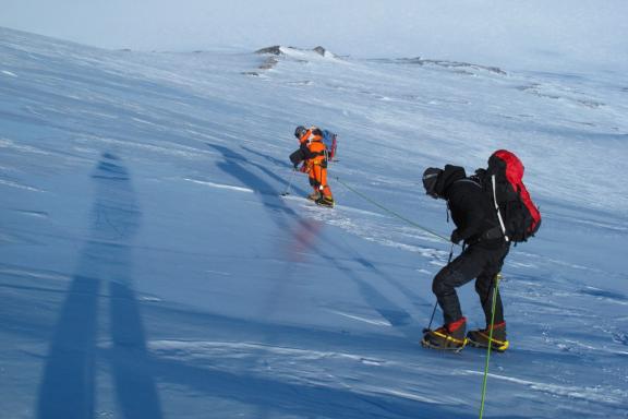 Climbers cross blue-ice area on Mount Sidley's east ridge